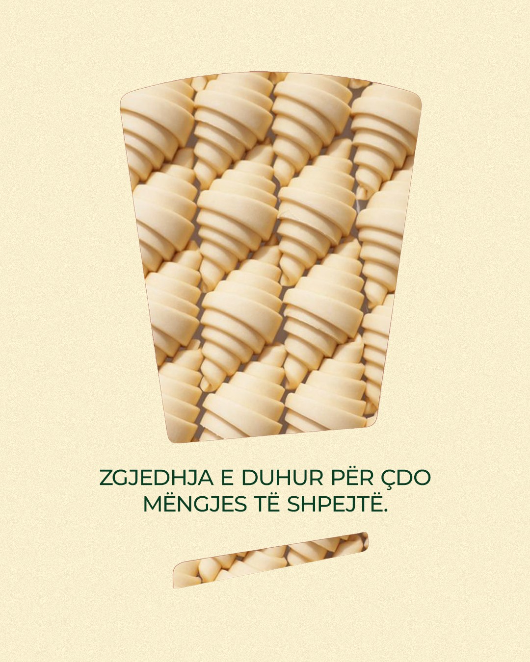 Unbaked croissants inside the Erlin logo shape