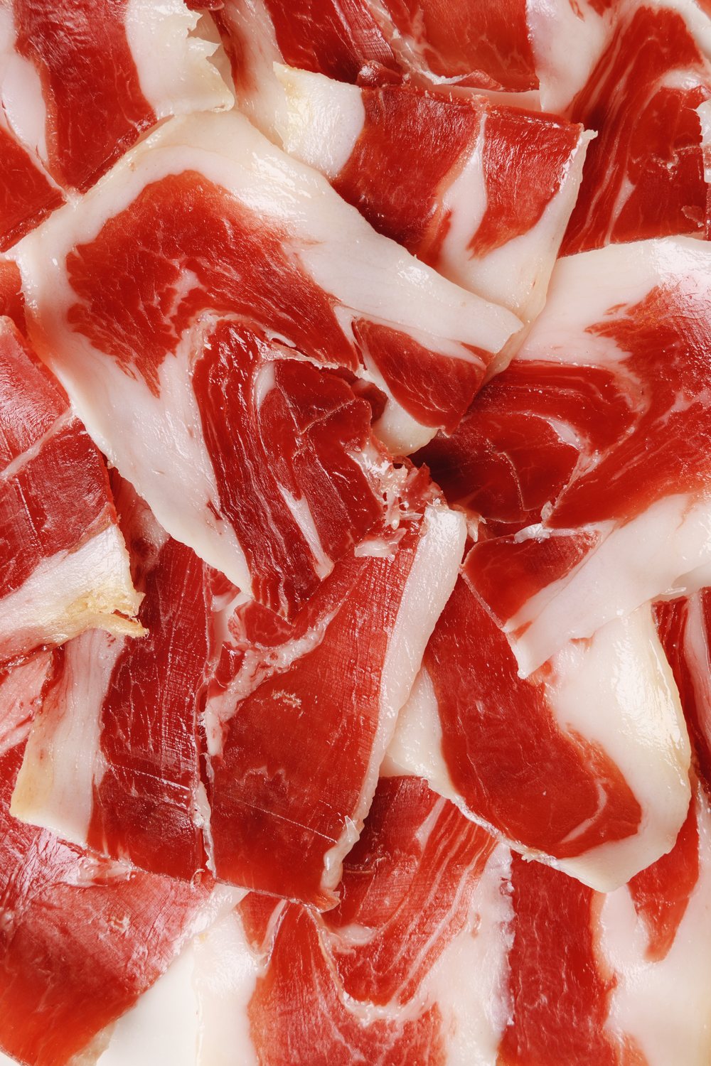 Close-up of thinly sliced cured ham