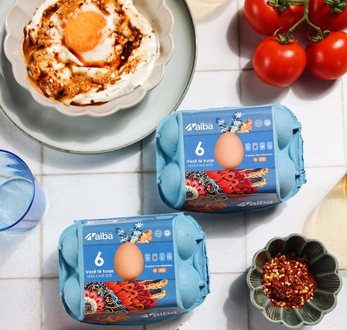 Aiba red eggs cartons with tomatoes and chili flakes