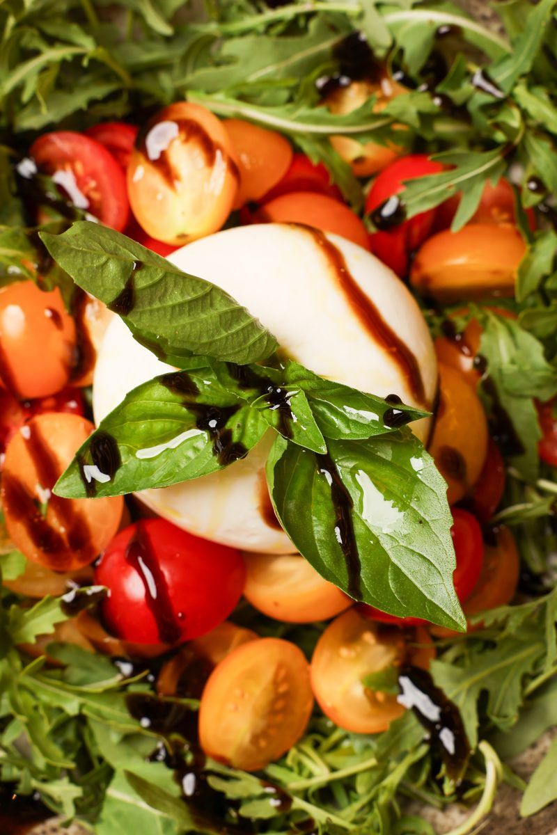 Burrata with cherry tomatoes, rocket, basil and balsamic