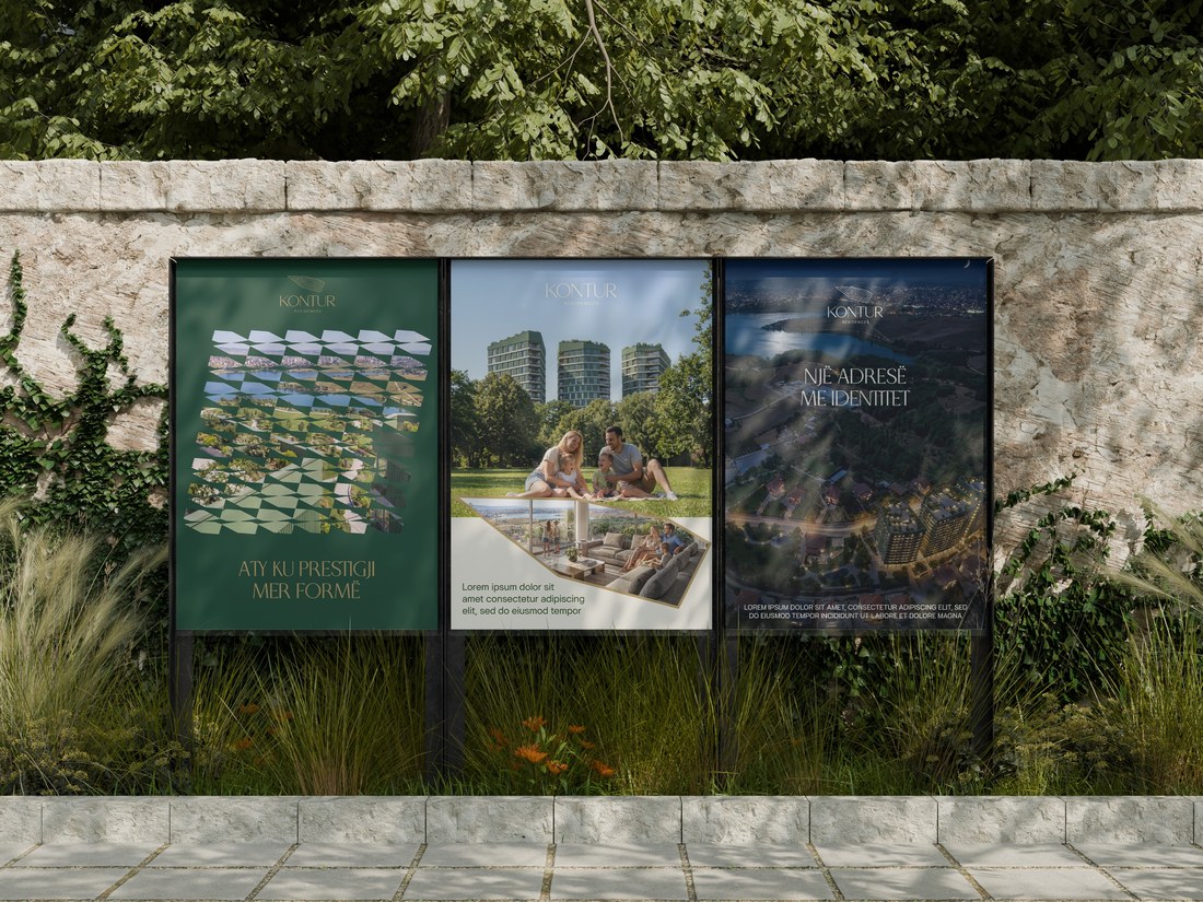 Three Kontur Residences outdoor posters mounted on a stone wall