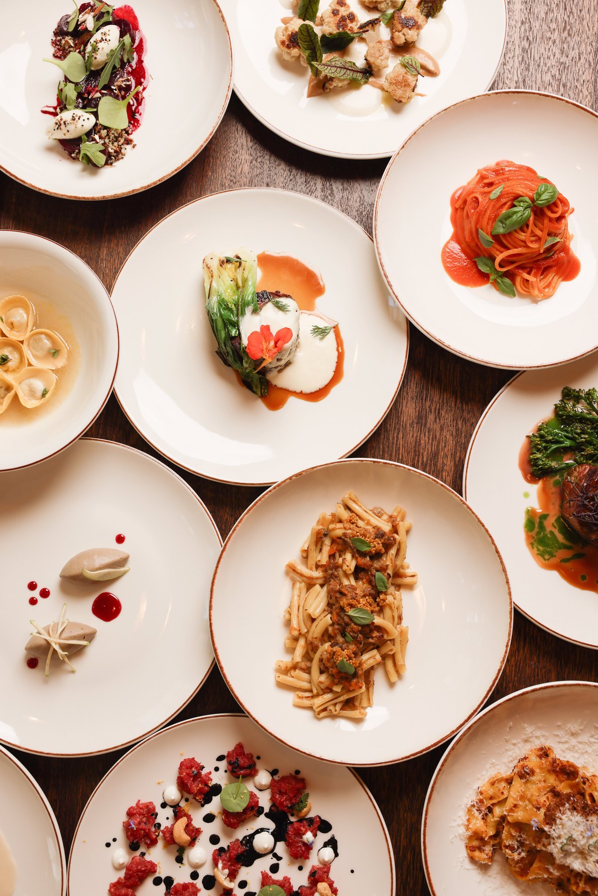 Overhead spread of the menu&rsquo;s dishes