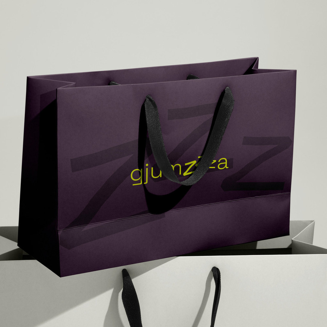 Deep plum Gjumza shopping bag with lime wordmark