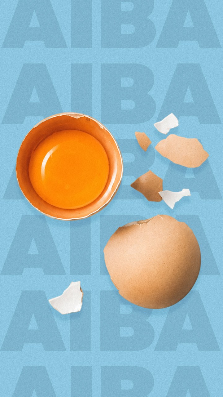 Story: cracked egg over an AIBA type pattern
