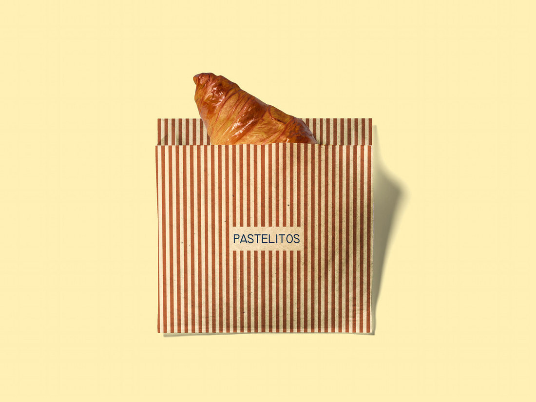 Striped Pastelitos pastry bag with a croissant on yellow