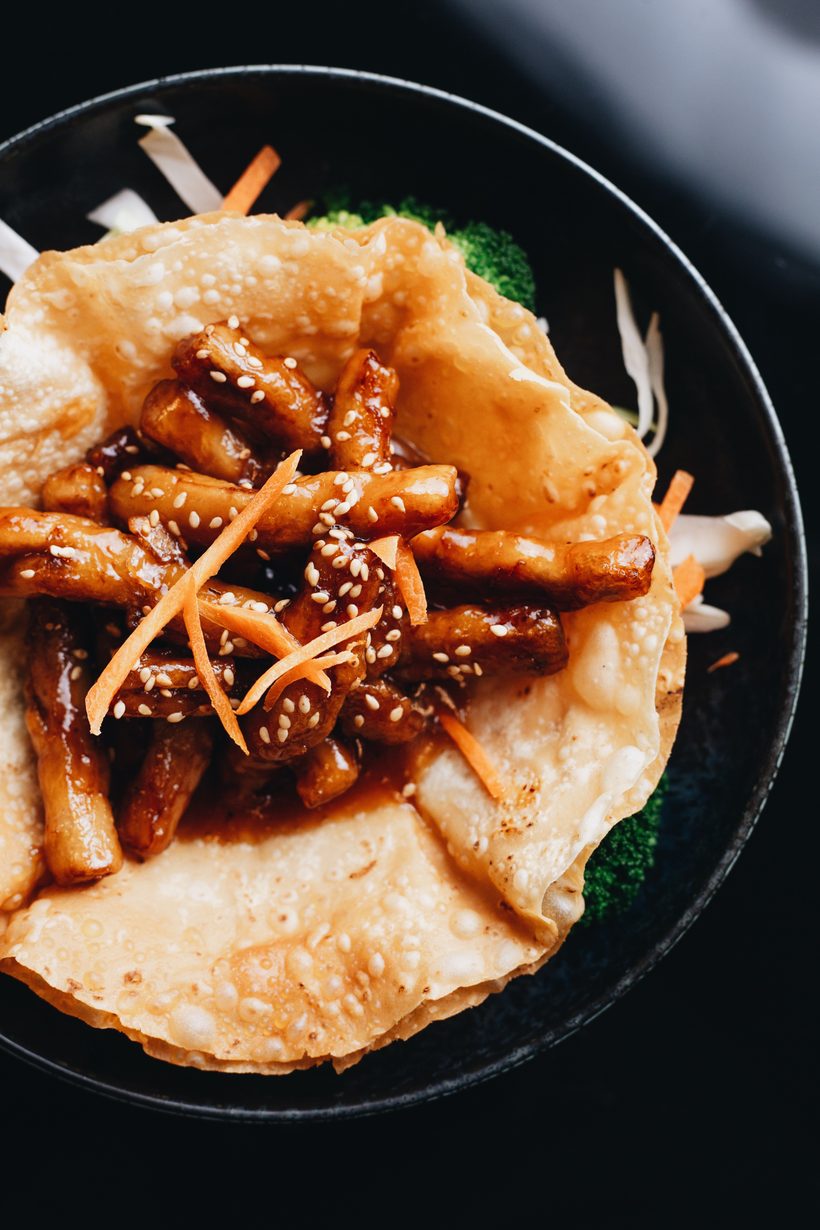 Glazed teriyaki strips in a crispy wonton basket