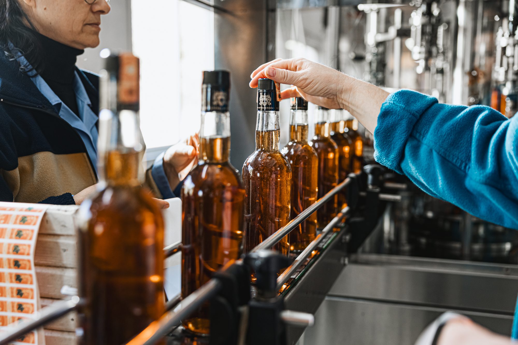 Skënderbeu brandy bottles on the bottling line
