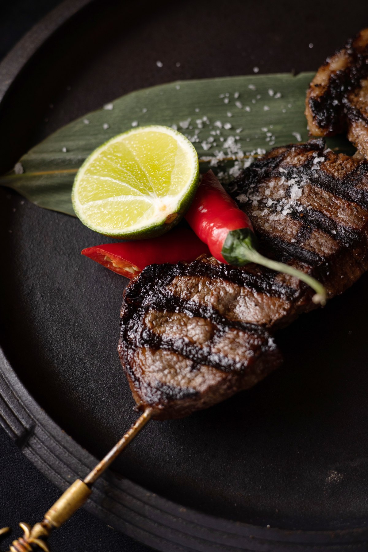 Grilled beef skewer with lime, chilli and flaky salt