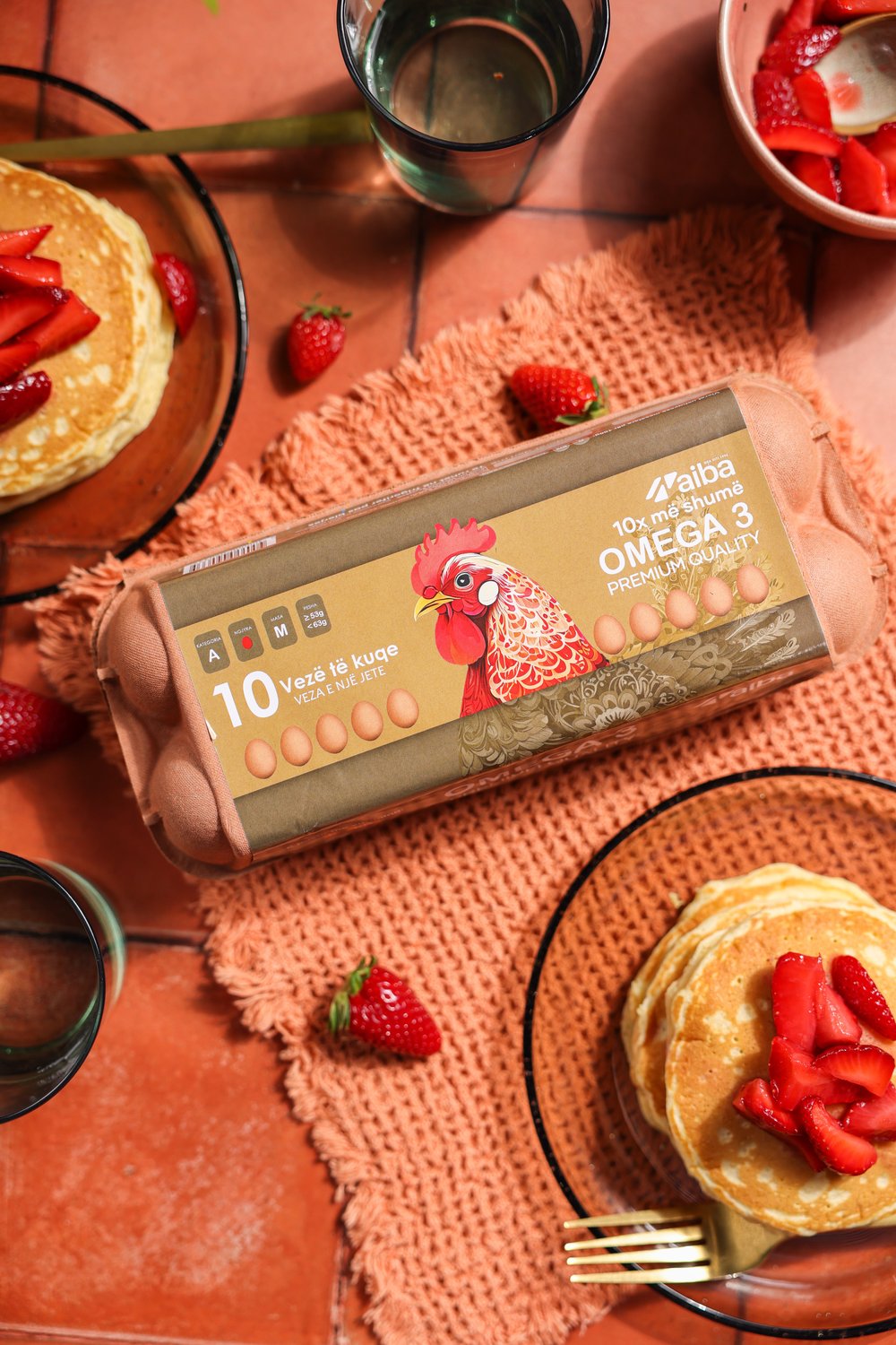 Pancakes with strawberries and an AIBA Omega 3 carton