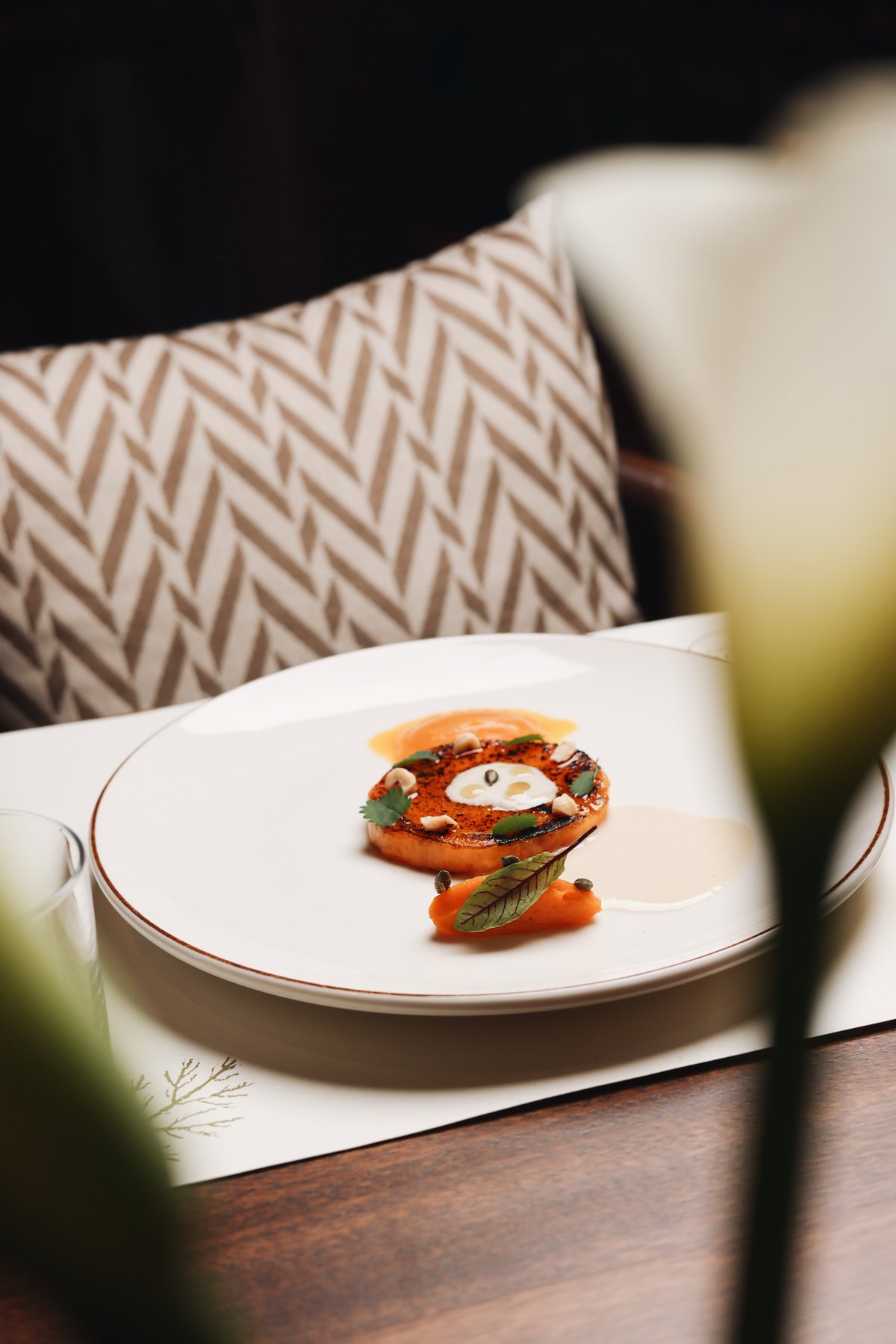 Roasted pumpkin with carrot purée and hazelnuts