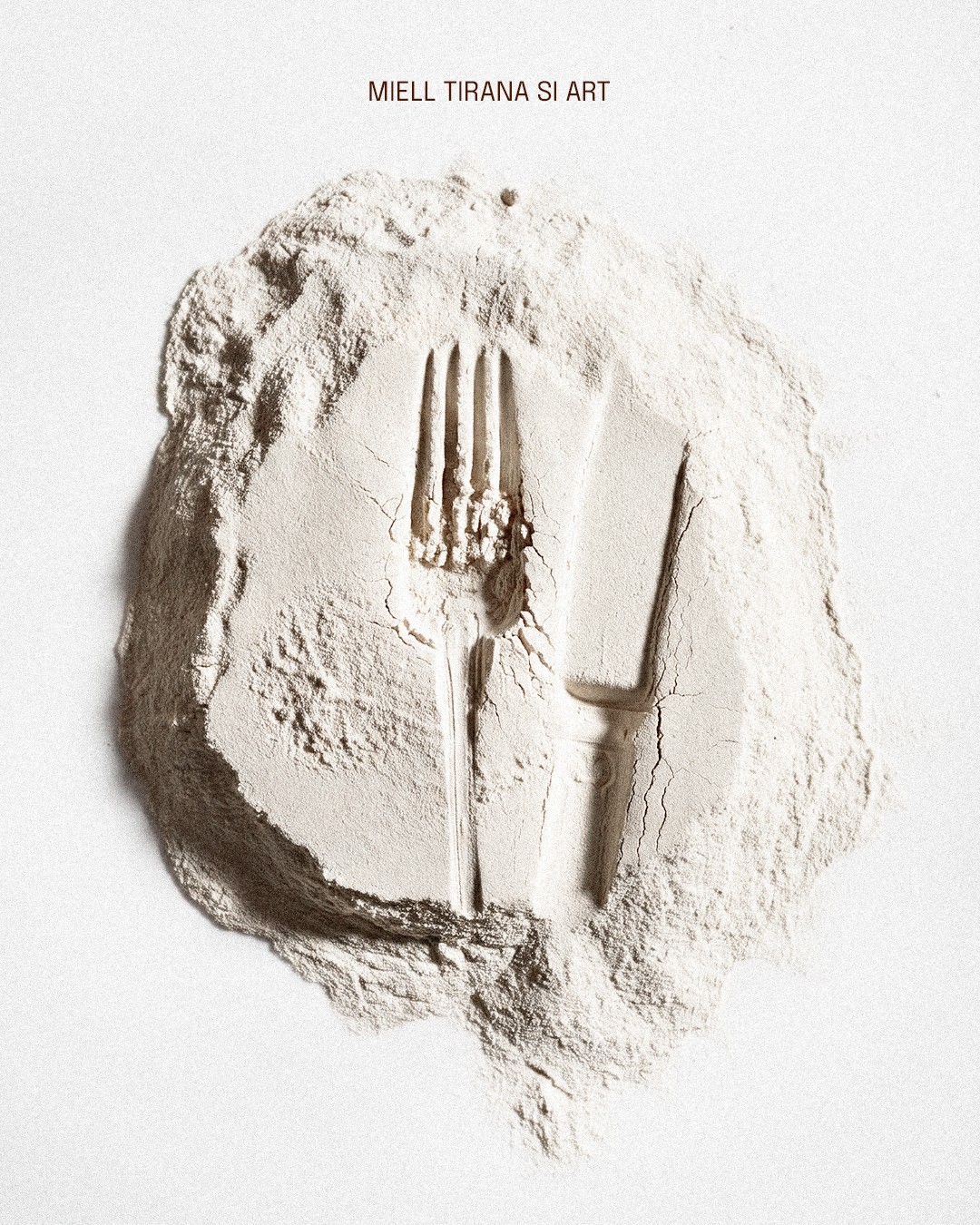 Fork and knife pressed into flour: Miell Tirana as art