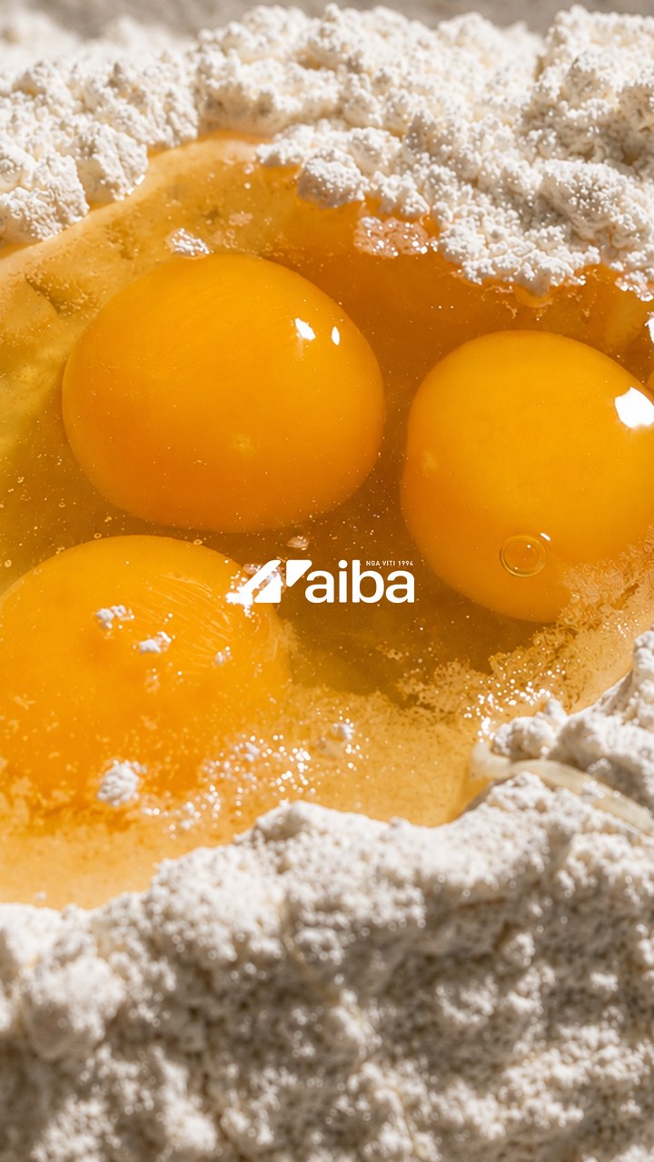 Story: egg yolks in a well of flour with the AIBA logo