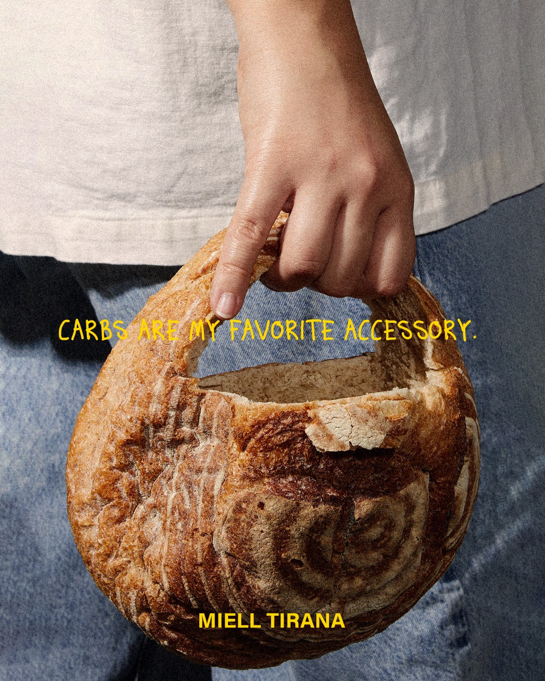Loaf of bread carried like a handbag: carbs are my favourite accessory
