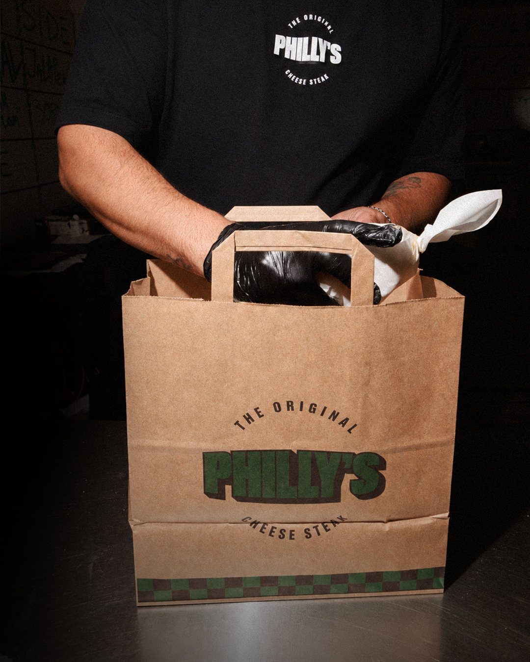 Takeaway order packed into a Philly&rsquo;s paper bag