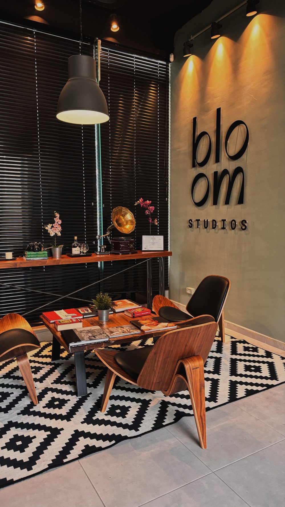 The Bloom Studios lounge, with the wordmark on the wall