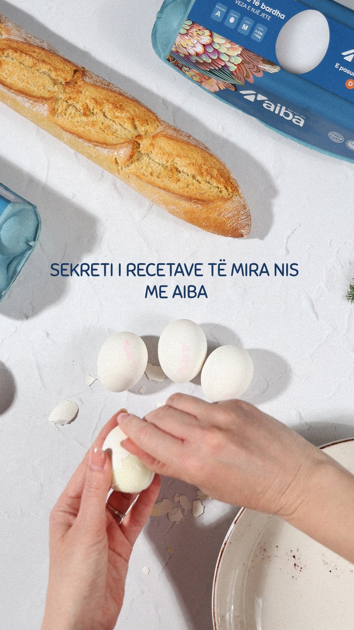 Story: peeling boiled eggs beside a baguette and AIBA cartons
