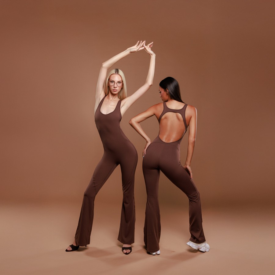Two models in brown LULU flared jumpsuits