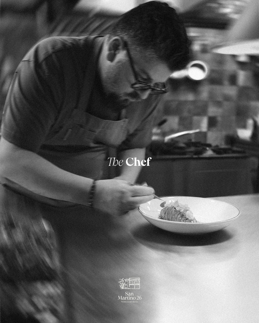 Black-and-white portrait of the chef plating: The Chef