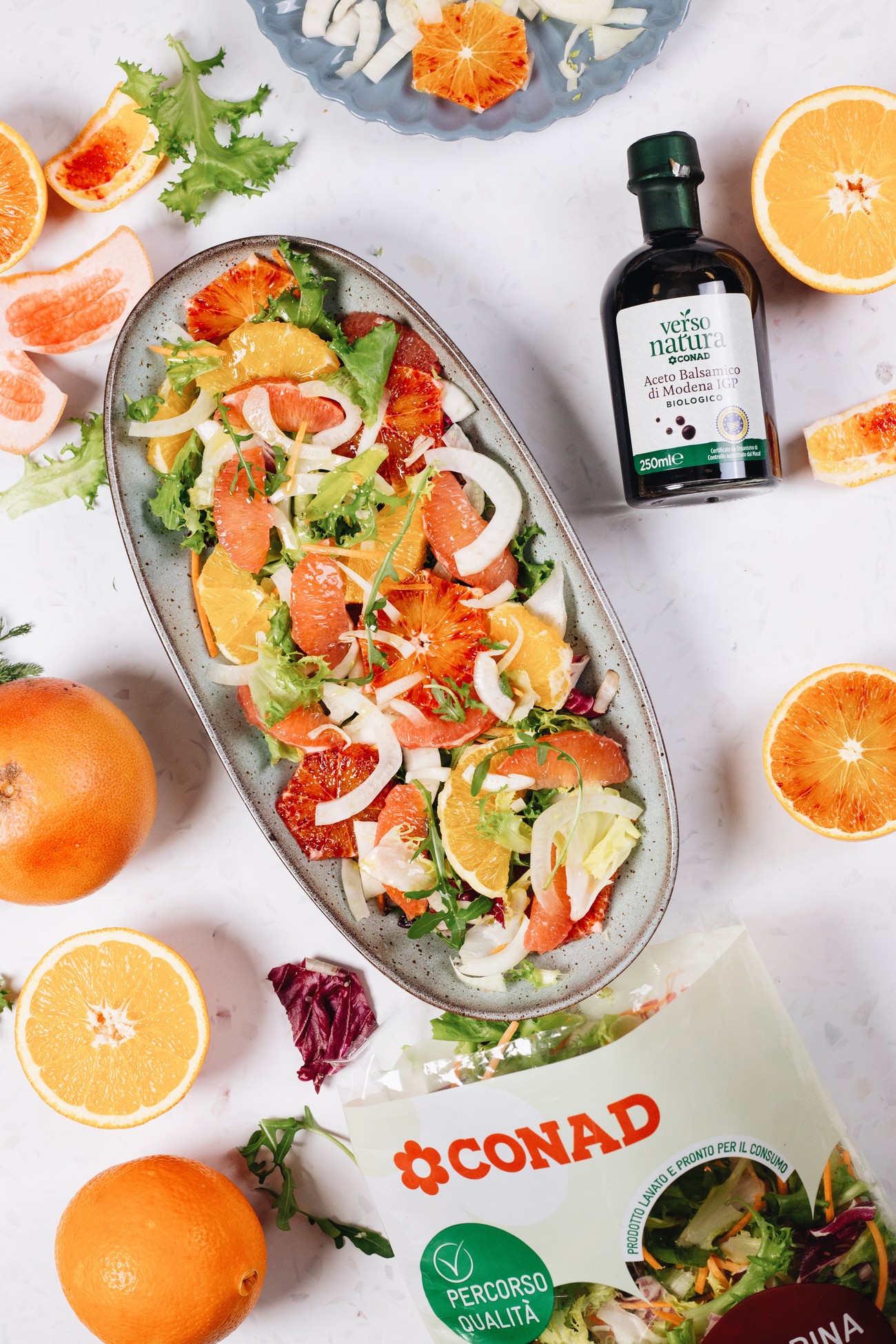 Blood orange and fennel salad styled with Verso Natura balsamic vinegar and a CONAD salad bag