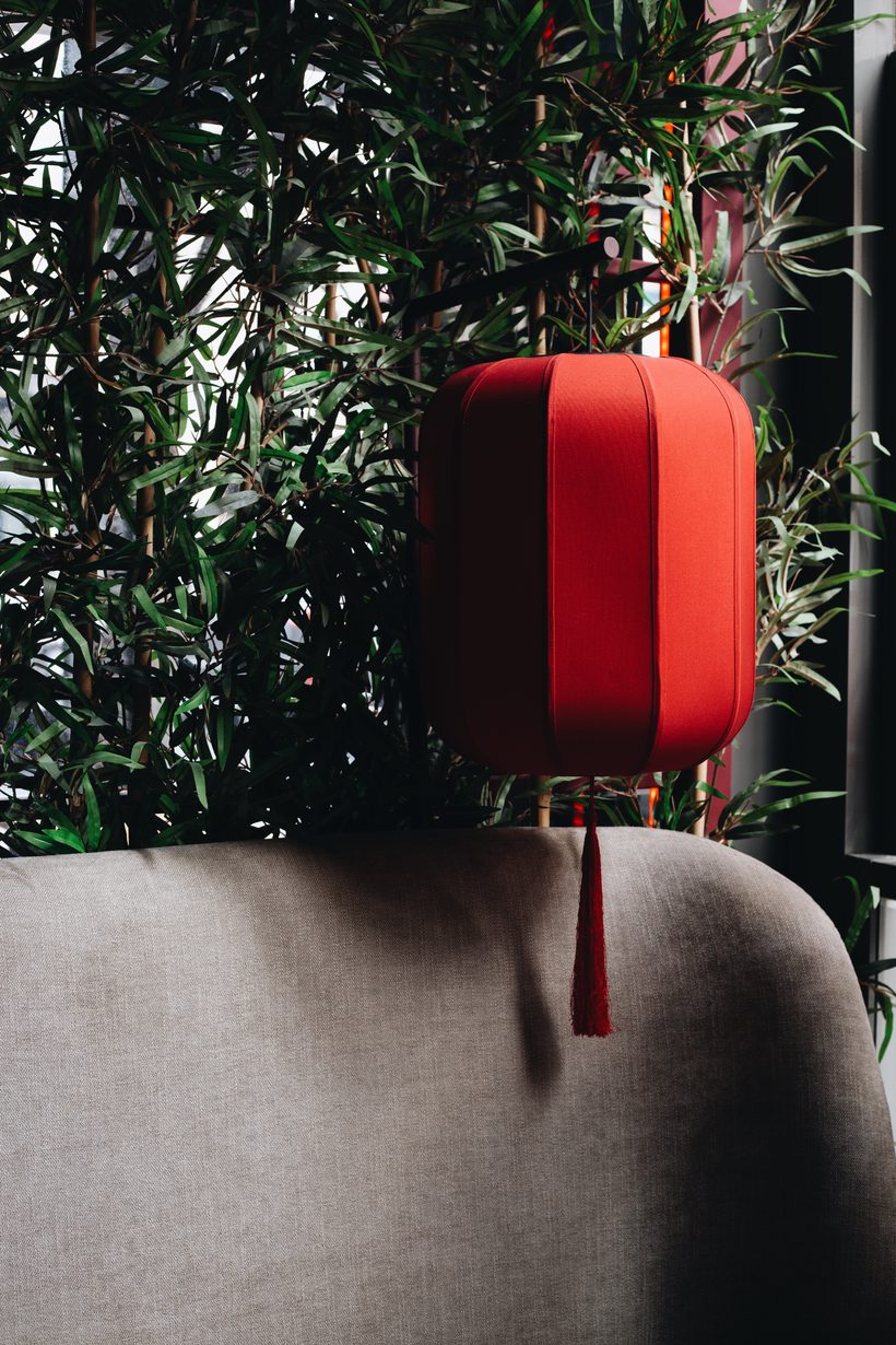 Red lantern against bamboo in the dining room