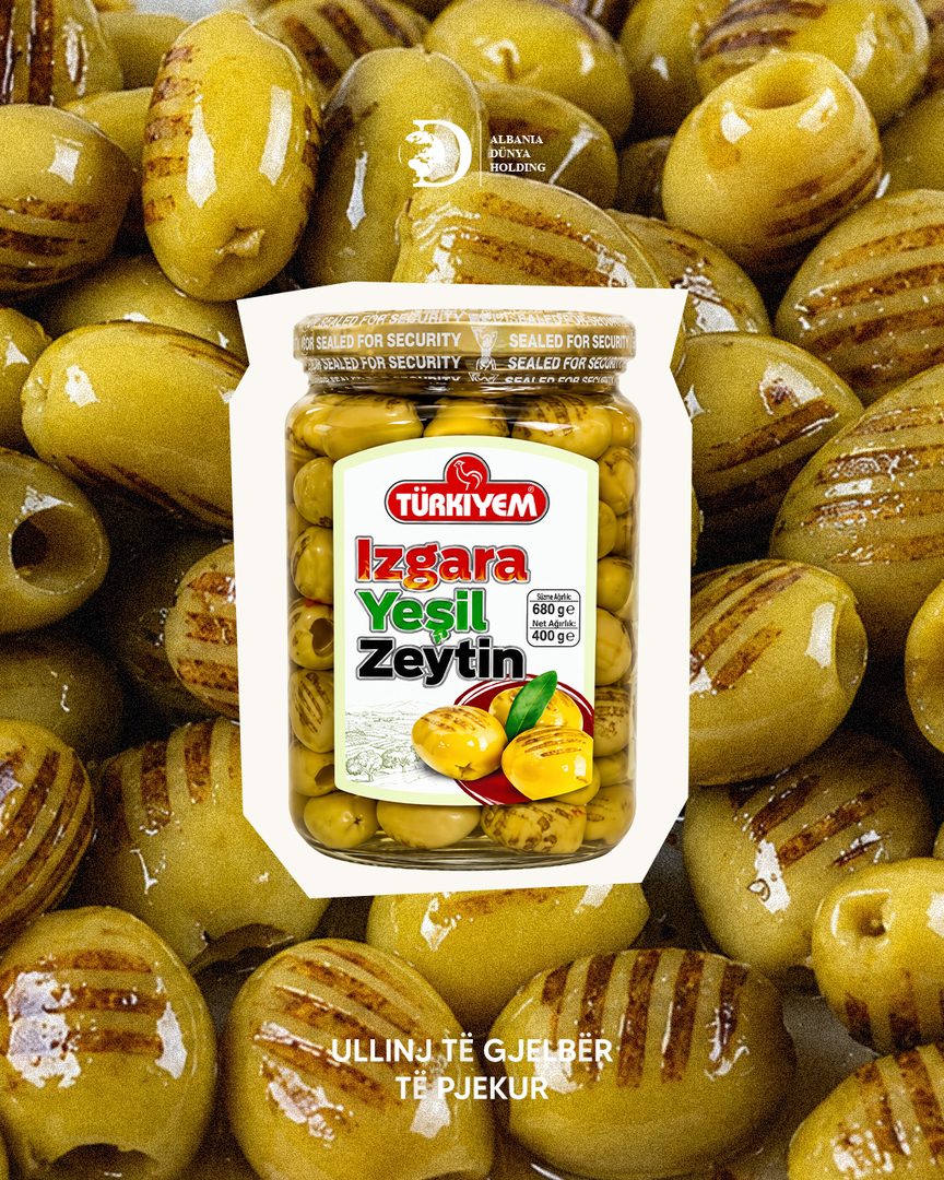 Türkiyem grilled green olives jar over a bed of grilled olives