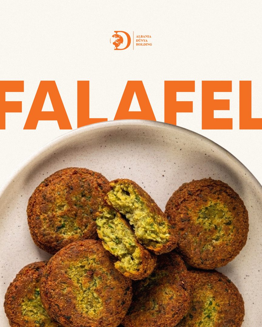 Falafel on a speckled plate under large orange type